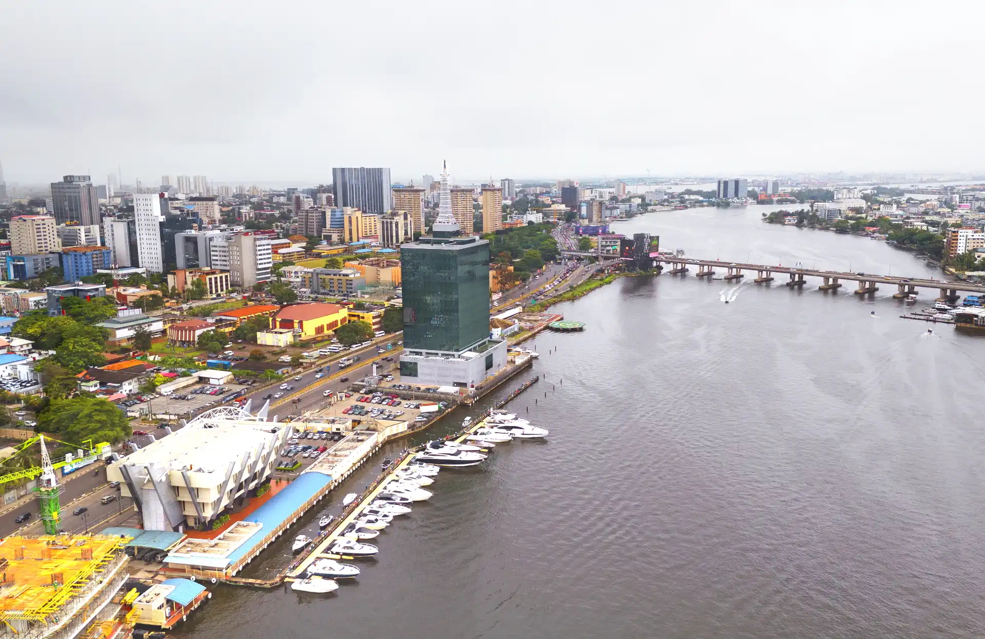 Mainland Vs Island Lagos 2026: Which Side Fits Your Trip Best? 1 Aerial view of Victoria Island Lagos beside Lagos Lagoon, Mainland vs Island Lagos