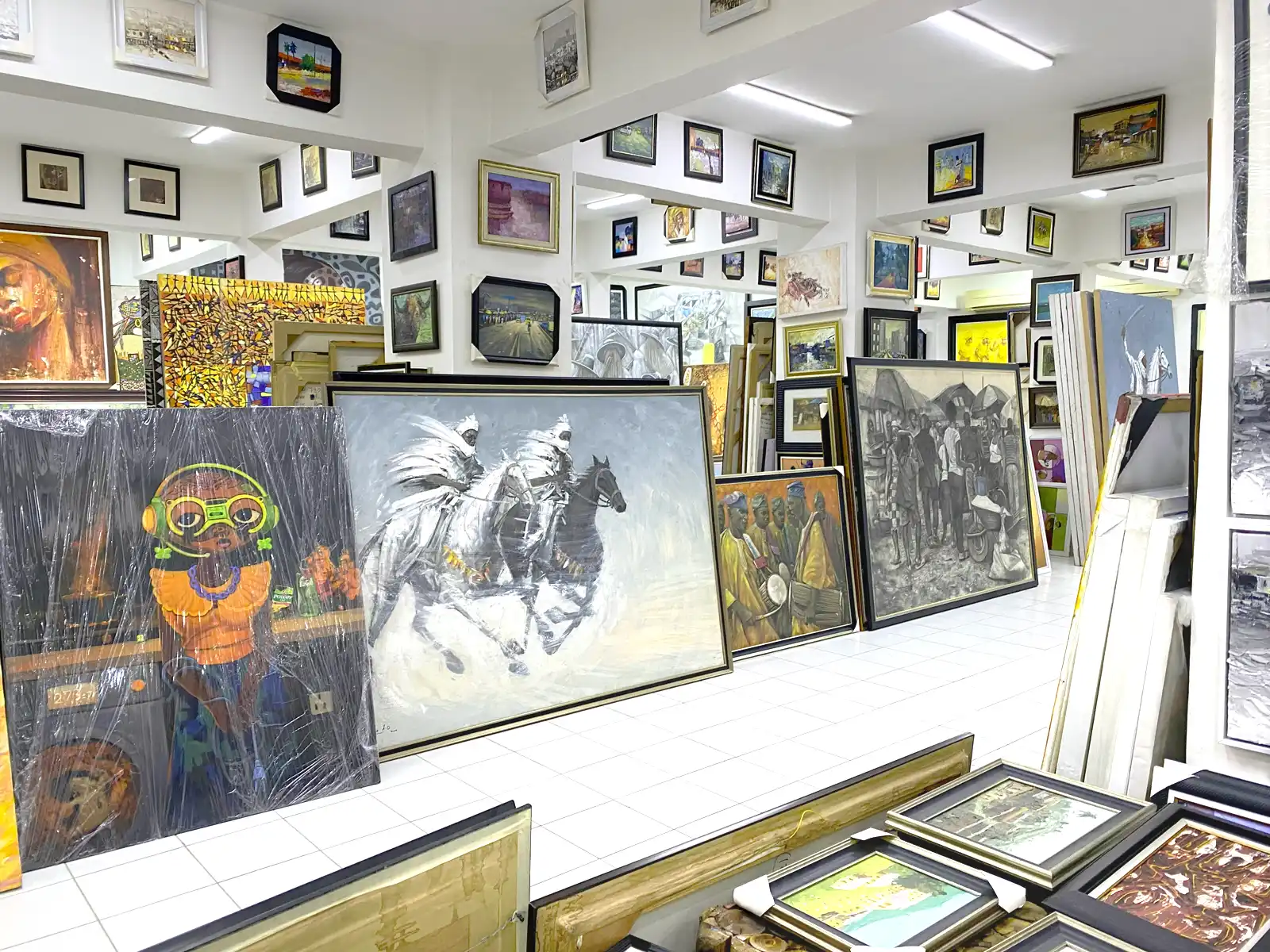 Lagos Weekend Bucket List 2026: 15 Brilliant Experiences To Try Before Monday 1 Nigerian artworks displayed inside Nike Art Gallery in Lekki Lagos